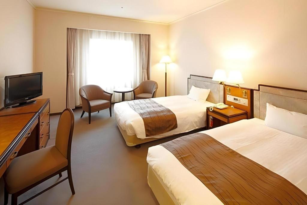Hotel New Omi Omihachiman Exteriör bild